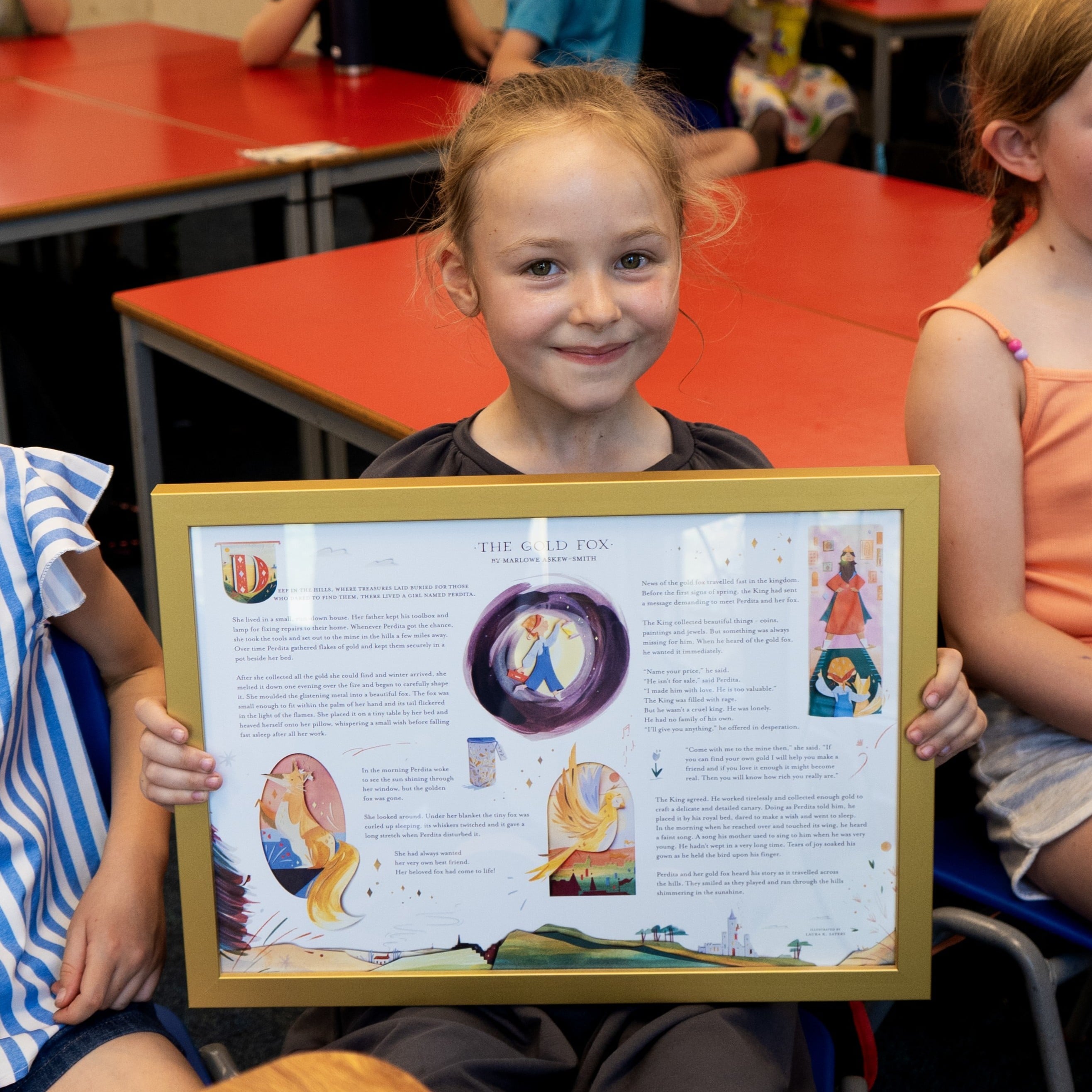Marlowe holding the illustrated story
