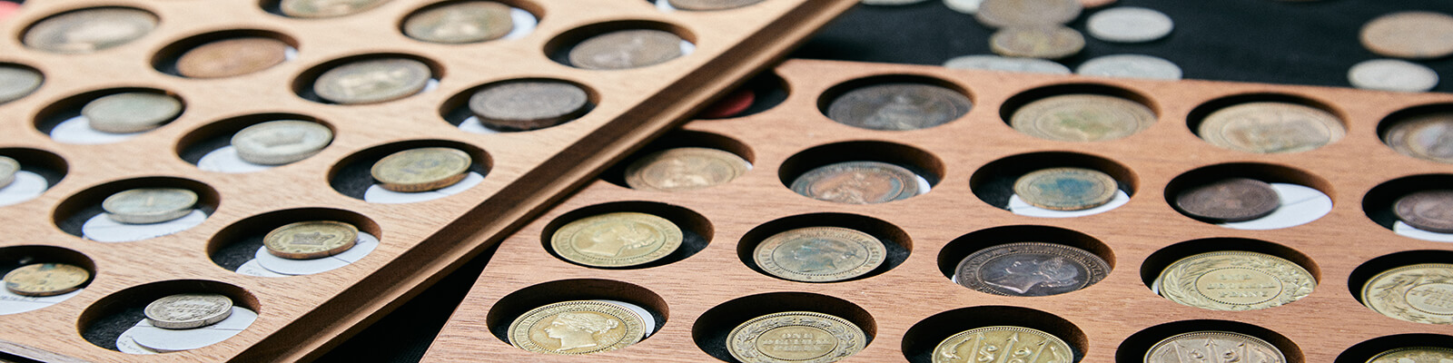 Image of wooden coin cabinets in the Royal Mint Museum